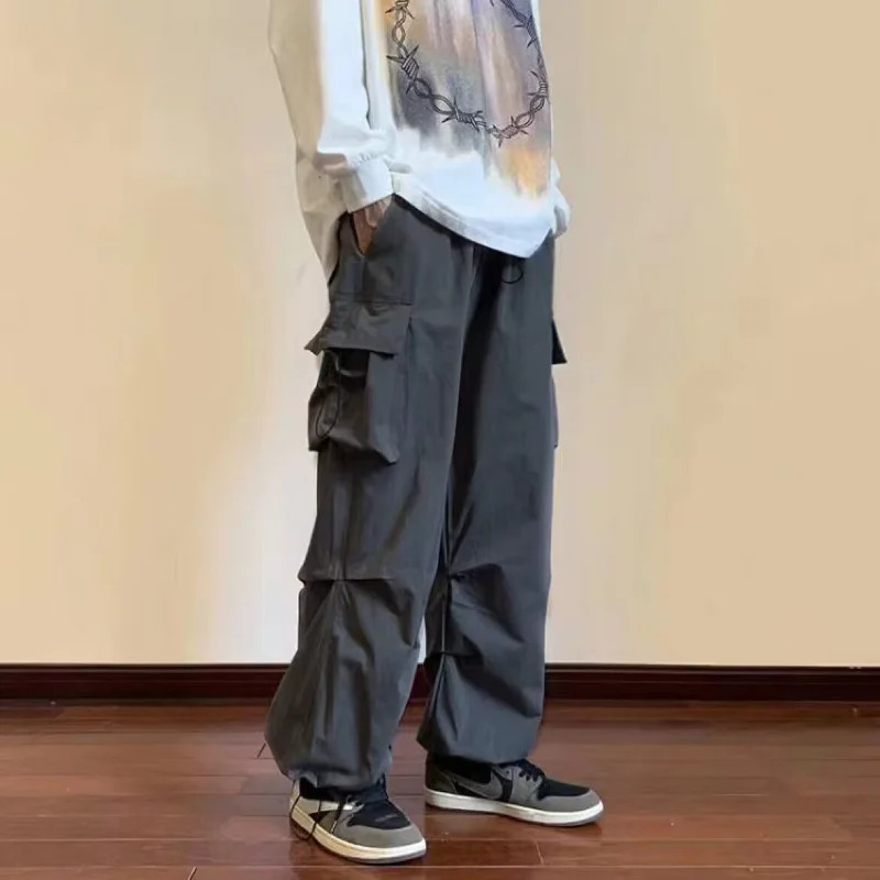 

Casual Men Cargo Pants Streetwear Drawstring Pocket Elastic Waist Baggy Trousers Hip Hop Loose Women Wide Leg Pants Overalls