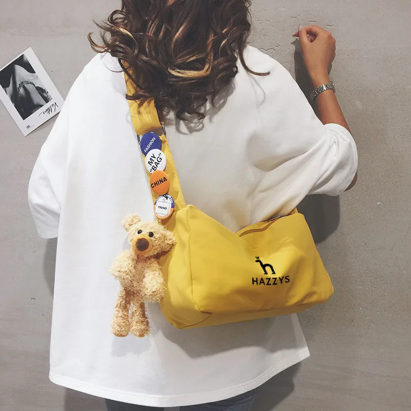 Hazzys Korean Men's and Women's Handbags Canvas Cameras Postman Backpack Storage Casual Bags