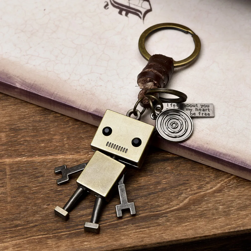 Simple cartoon cute robot cowhide keychain personalized retro woven key pendant creative bag pendant