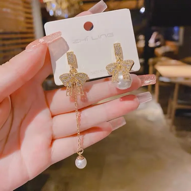 

Asymmetry Bow Pearl Earrings Dangle Crystals Round Pendant Modern Women's Earrings 2022 Aesthetic Gift New In Jewelry Wholesale