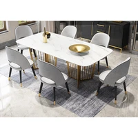 nordic modern style dining table set round marble top metal fashionable table with soft chairs for best service