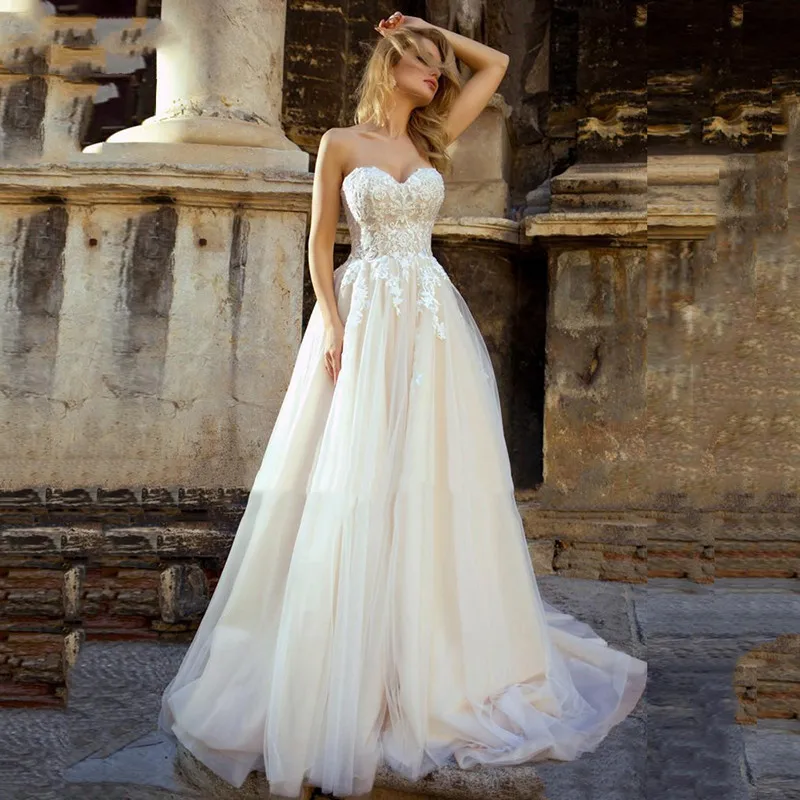 

Classic Sweetheart Sleeveless Wedding Dress Lace Applique Open Back Bride Gown A-Line Tulle Sweep Length Civil Vestidos De Novia