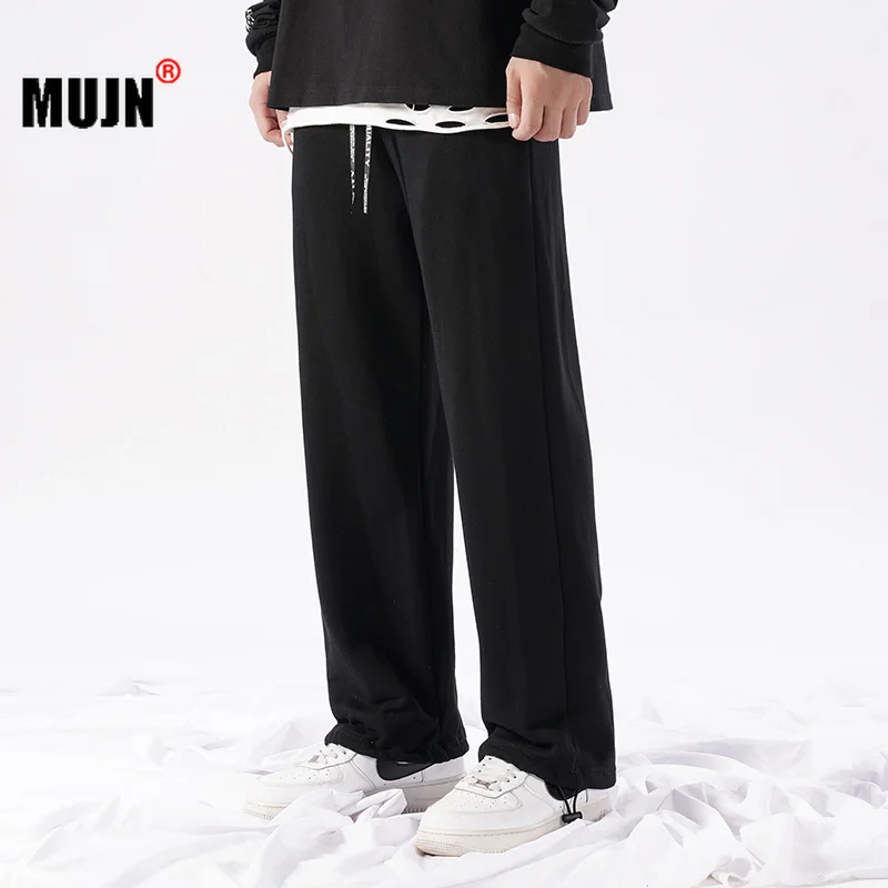 

2022 Spring Men Sports Pants Solid Color Elastic Waist Drawstring Men Trousers Joggers Hip Hop Loose Men Sweatpants Streetwear