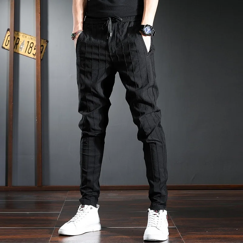 Мужские повседневные брюки Корейская уличная одежда черные Стрейчевые
