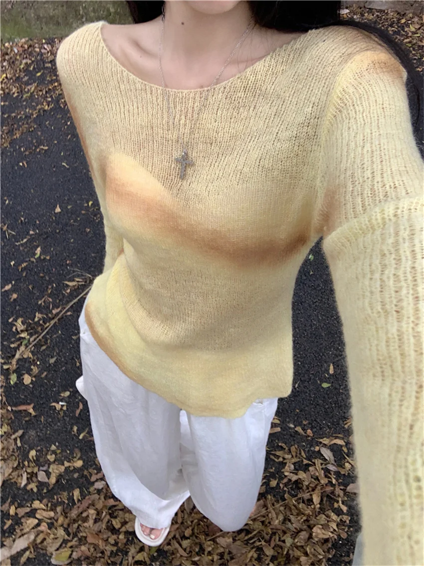 Женский трикотажный свитер свободного покроя с длинным рукавом