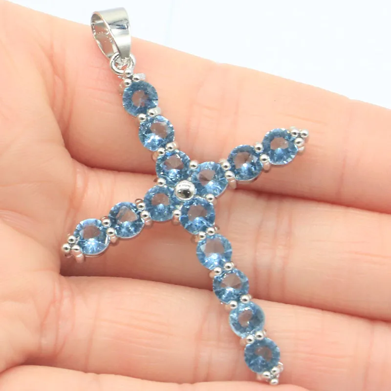 

Кулон из серебра 8,7 пробы с голубым топазом, аметистом, фиолетовым танзанитом