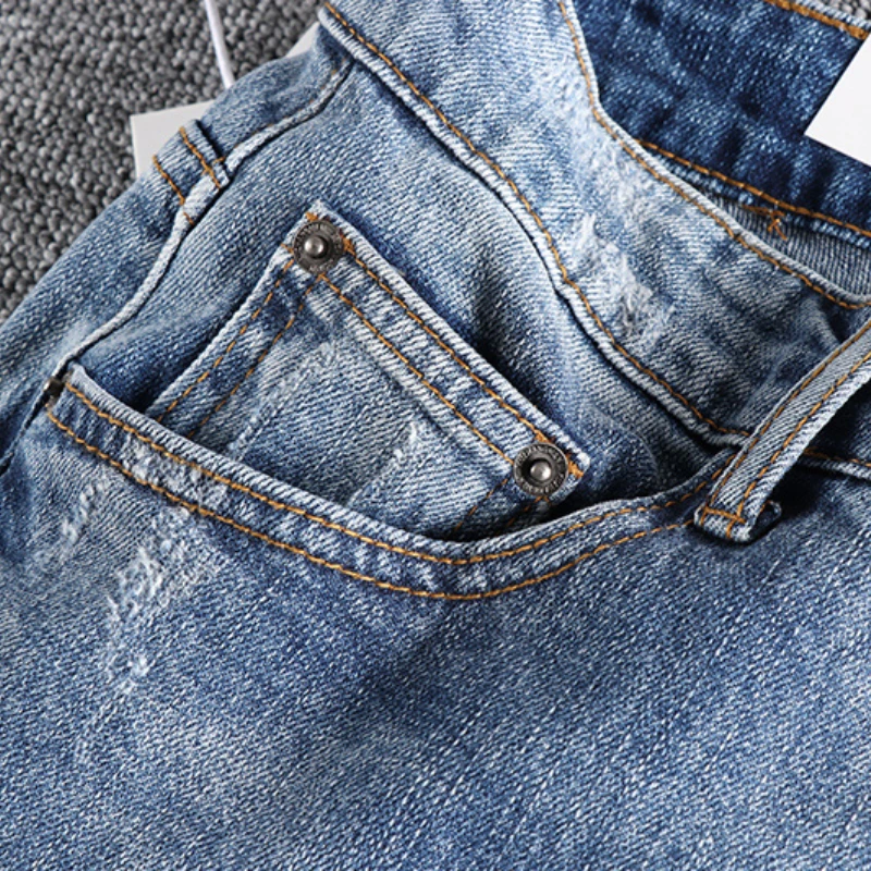 Pocket holes simple heavy water washed old blue jeans men's Korean style spring and summer new slim feet