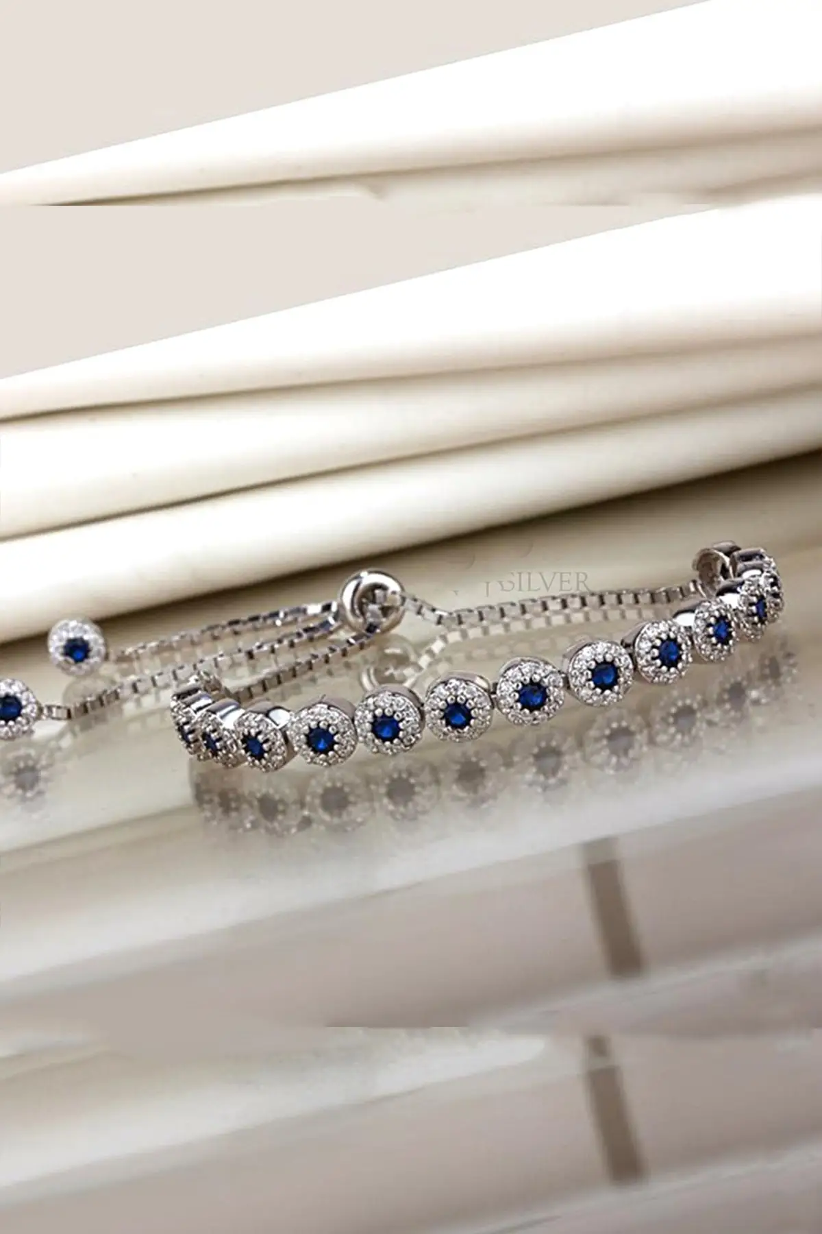 

925 Sterling Silver Blue Stone Lift Bracelet