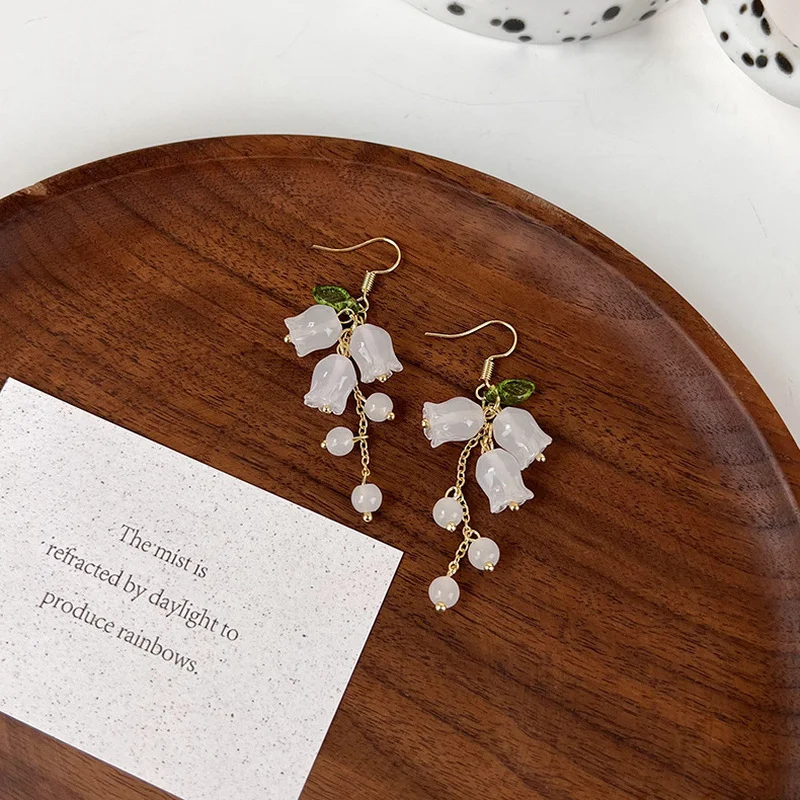 

Minar Personality White Color Resin Glass Bell Orchid Long Drop Earrings for Women Gold Color Chain Flower Tassel Earring Brinco