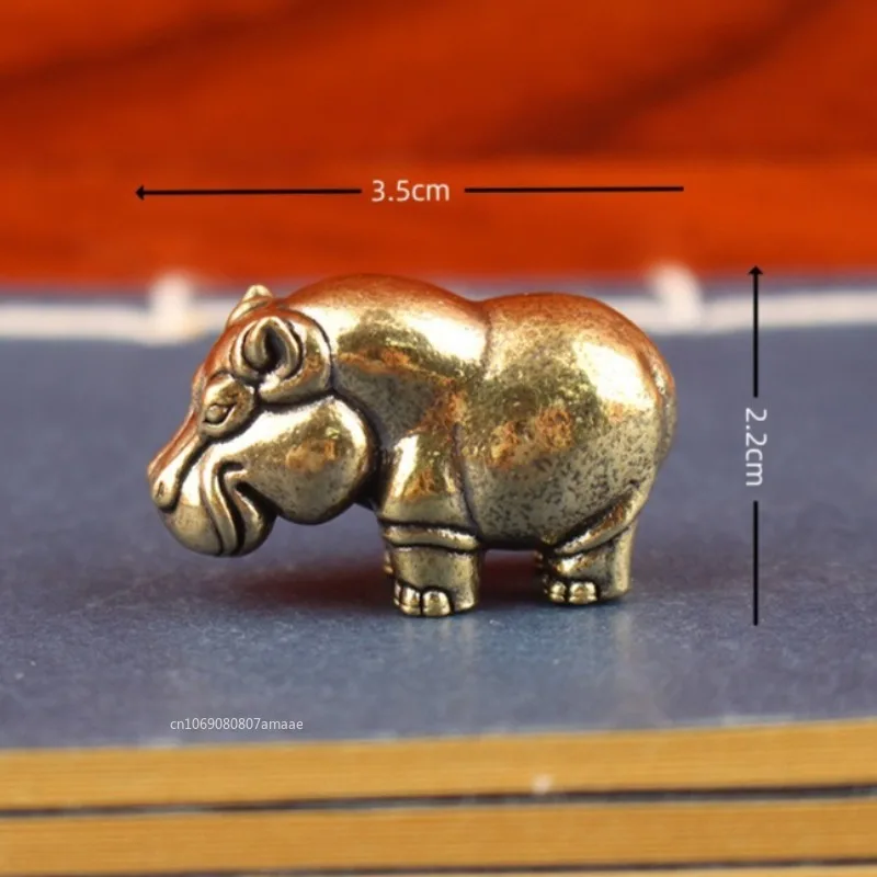 

Медные фигурки бегемотов