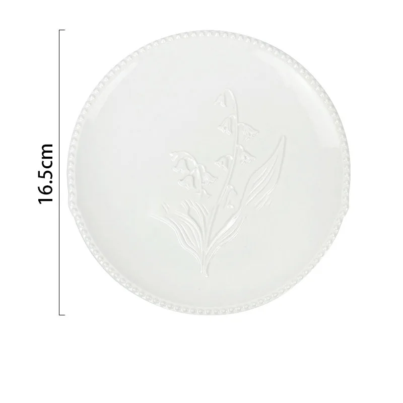 

Керамическая тарелка с цветочным рельефом