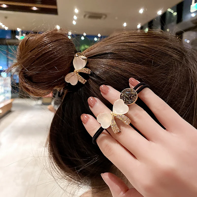 

Fashion Cat's Eye Stone Bow Hair Rope Female Simple Temperament Diamond-studded Ball Head High Elastic Ponytail Rubber Band