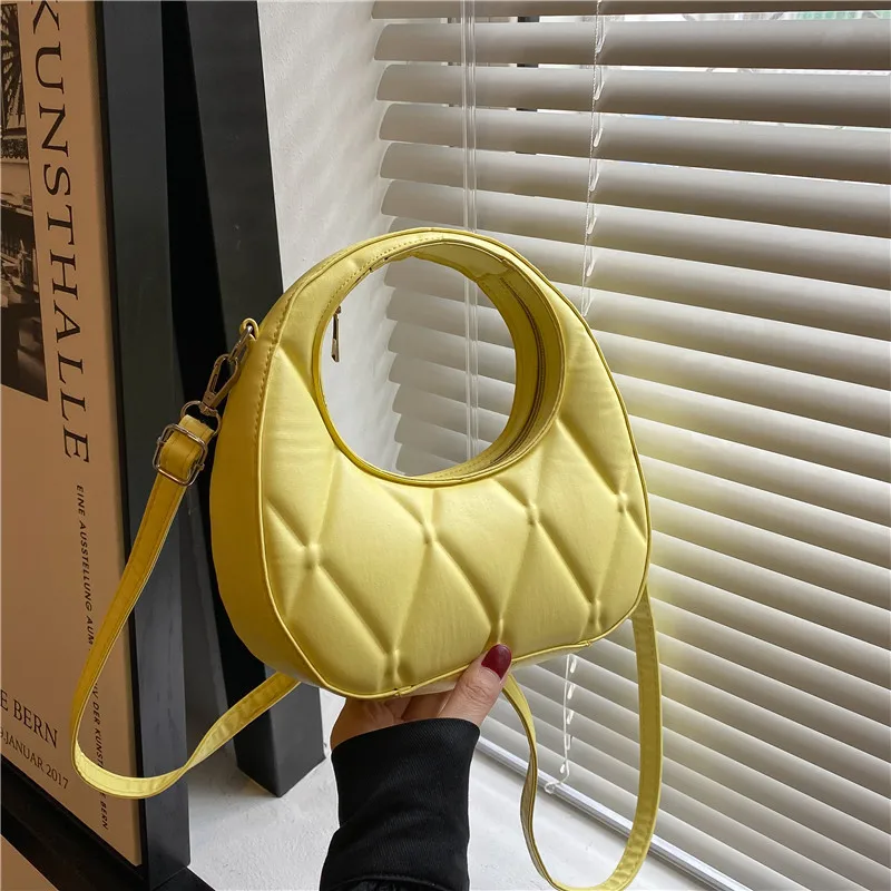

2022 new small bag female prismatic pressure shell new fashion Joker niche design advanced shoulder messenger bag