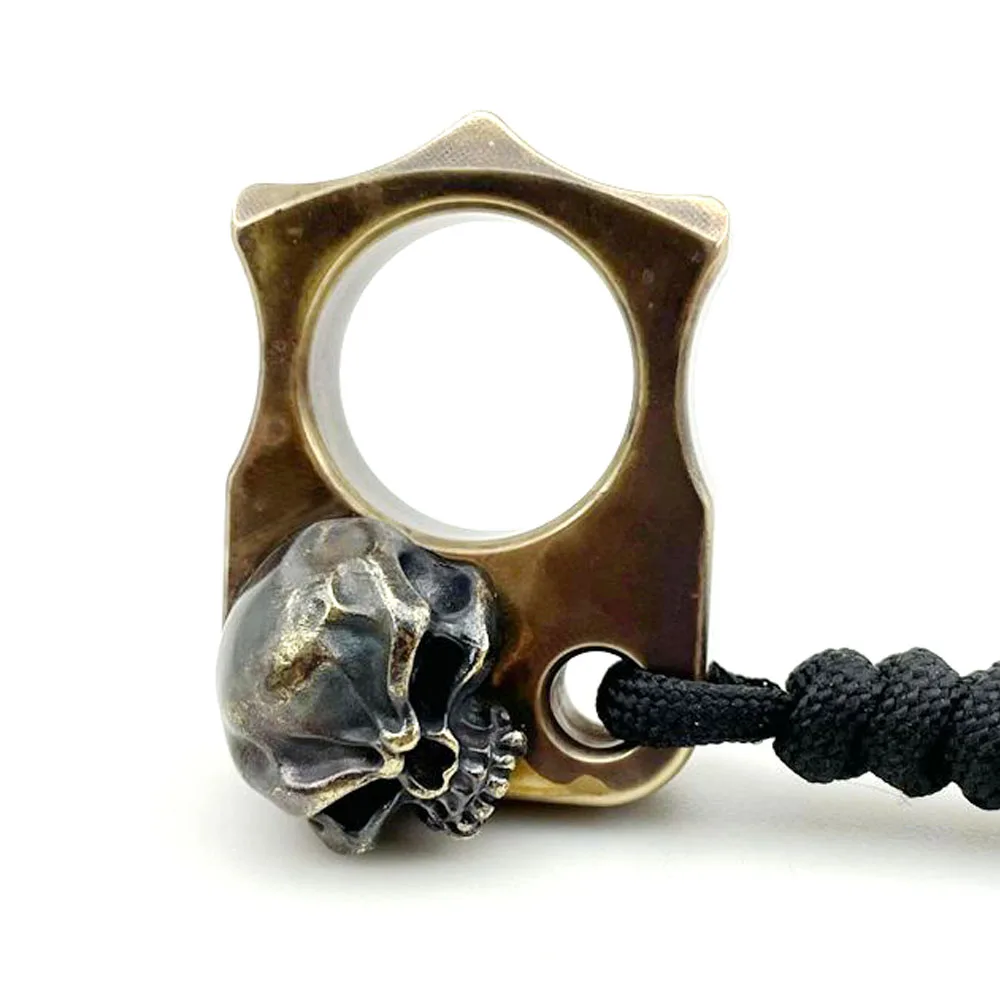 

Brass Skull Window Breaker Outdoors EDC Tactical Multifunction Portable Tool Keychain Hanging Parachute Cord Crush Safe