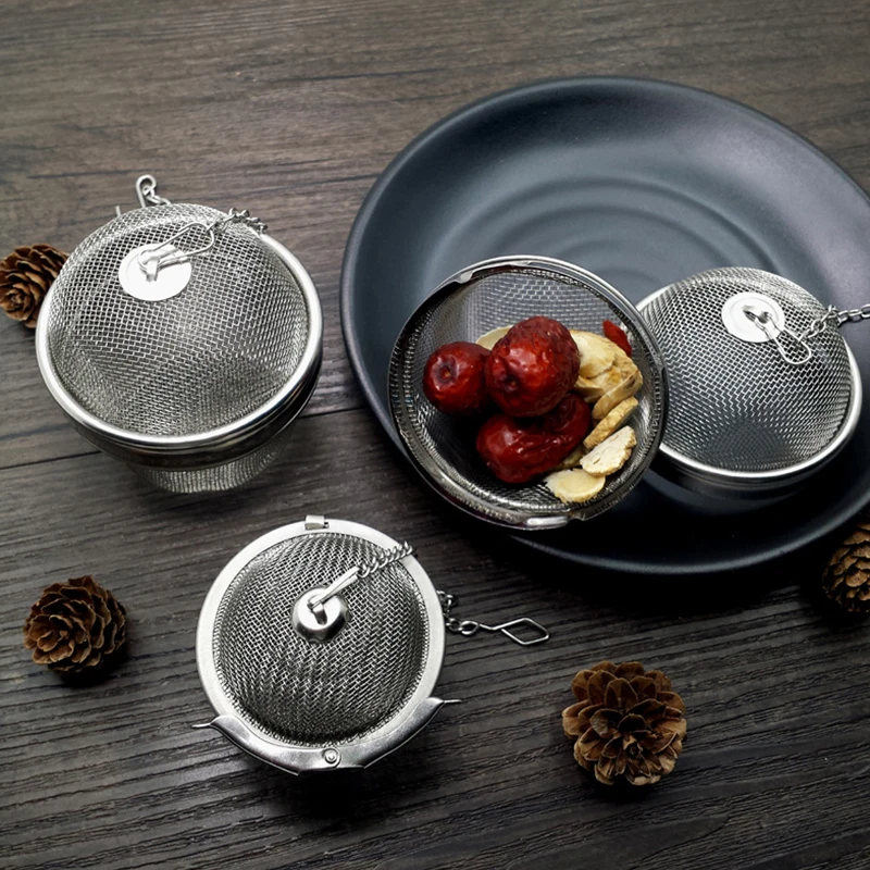 

Hot Tea Leak Stainless Steel Ball Tea Leaf Spice Ball Rope Chain Hook Home Kitchen Tools Mesh Filter Strainer Tea Infuser