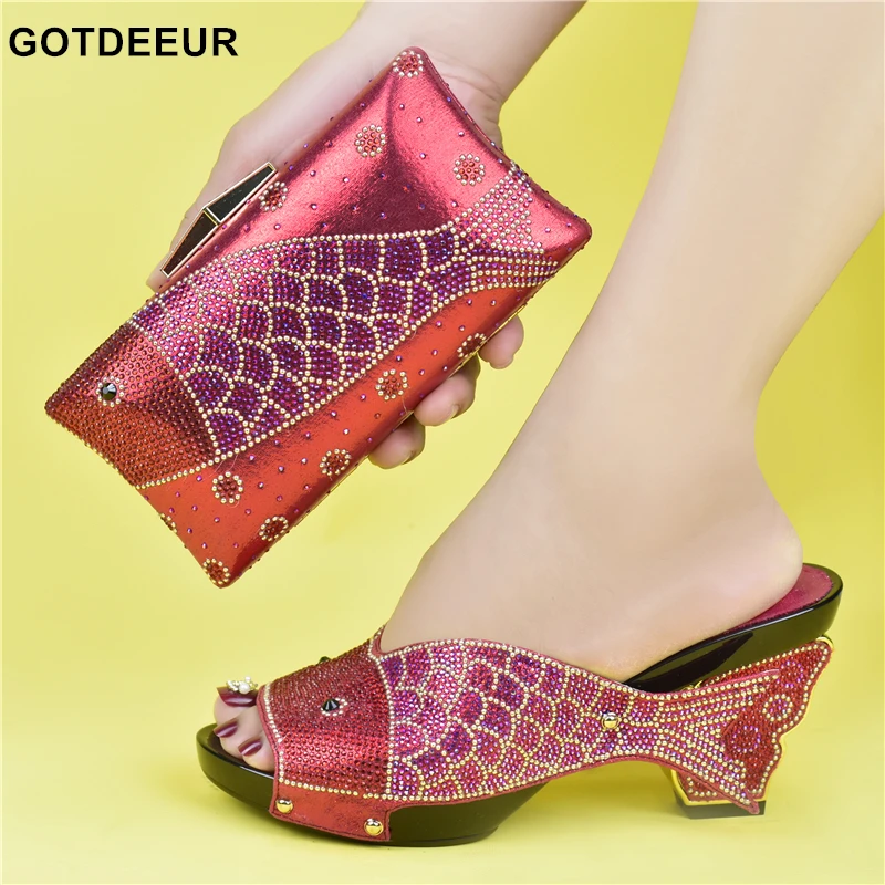 

Туфли и сумочки красного цвета в итальянском стиле, украшенные нигерийскими стразами, женские свадебные яркие высококачественные туфли