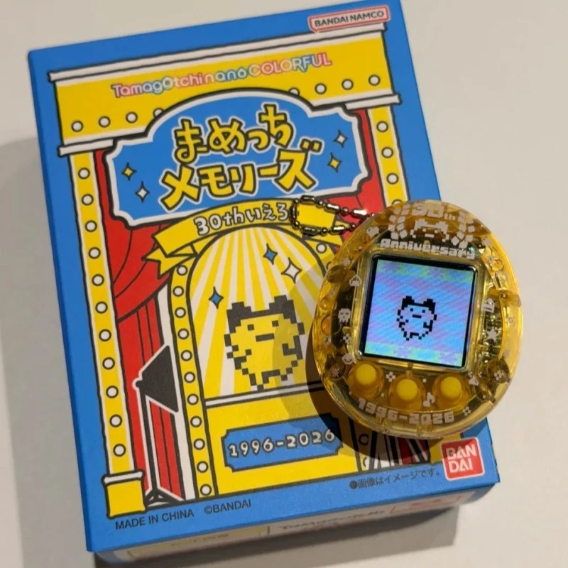 Фото PB Bandai Tamagotchi Nano - Mametchi Memories к 30-летию (желтый / синий) - коллекционный декор для рабочего стола, подарок. №4