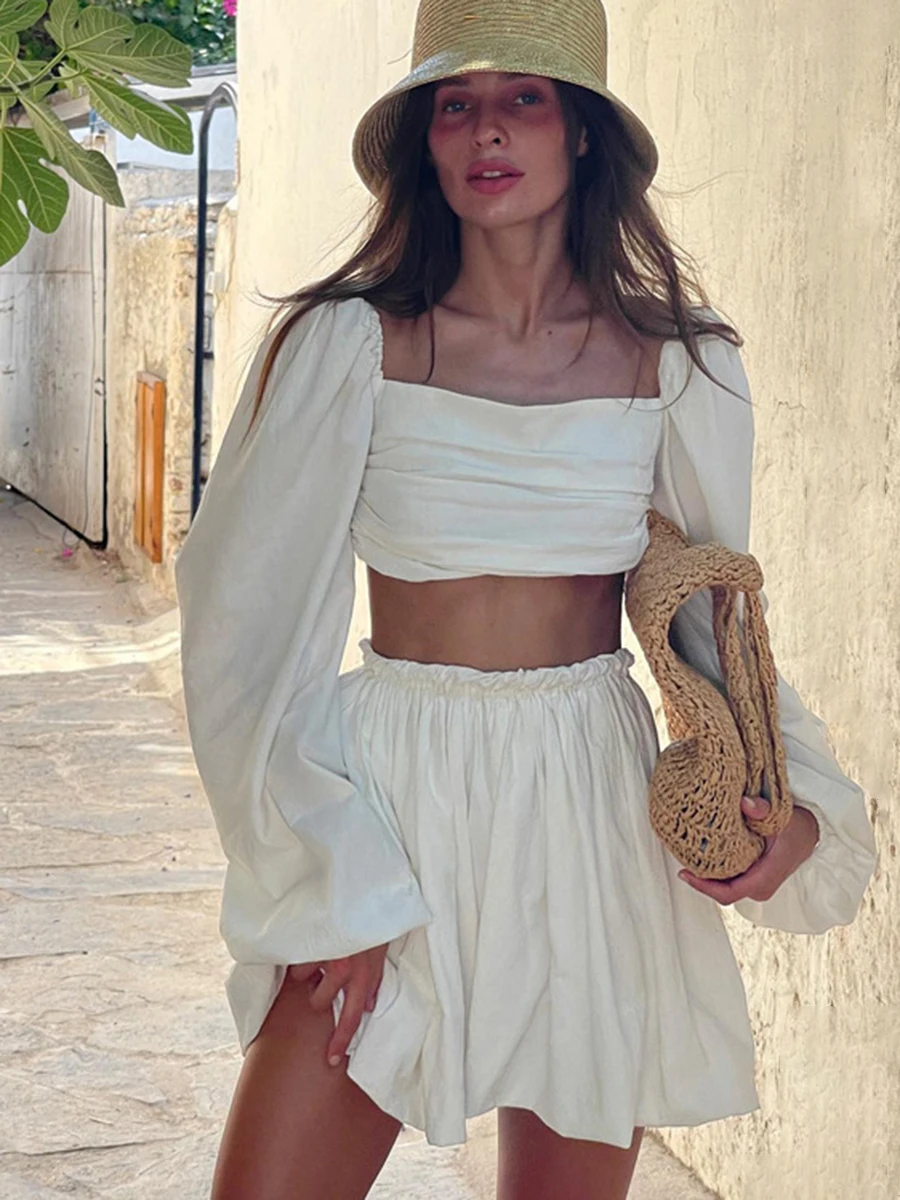 

Однотонный хлопковый Повседневный женский костюм, женские комплекты с топом на шнуровке с пышными рукавами и юбкой со складками, летний элегантный винтажный шикарный уютный комплект из двух предметов