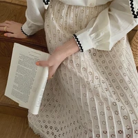 fashionable temperament casual design sense of niche french temperament hollow lace tassel a line mid length skirt
