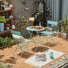 철 예술 레저 접이식 테이블과 의자 조합 간단한 안뜰 야외 캠핑 테이블 넓은 중공 좌석 표면 의자