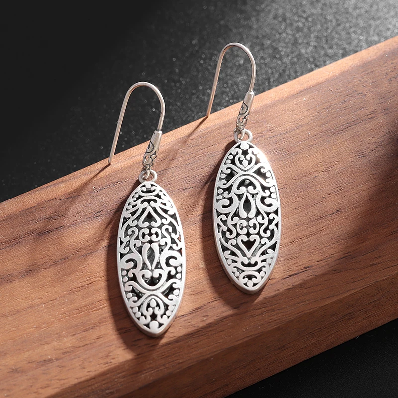 

Exquisite Retro Hollow Carved Oval Earrings Hypoallergenic Dangle Earrings Women's Fashion Party Ethnic Style Jewelry Gifts