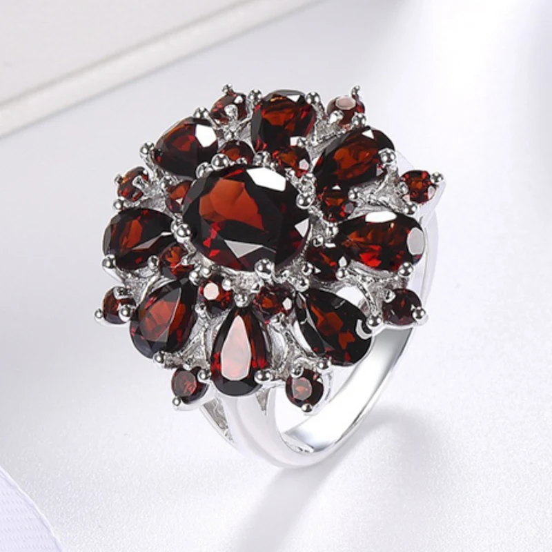 

Hot Sale Classic Silver Color Inlaid Garnet Red Zircon Flower Shape Ladies Banquet Ring Jewelry Whole Sale