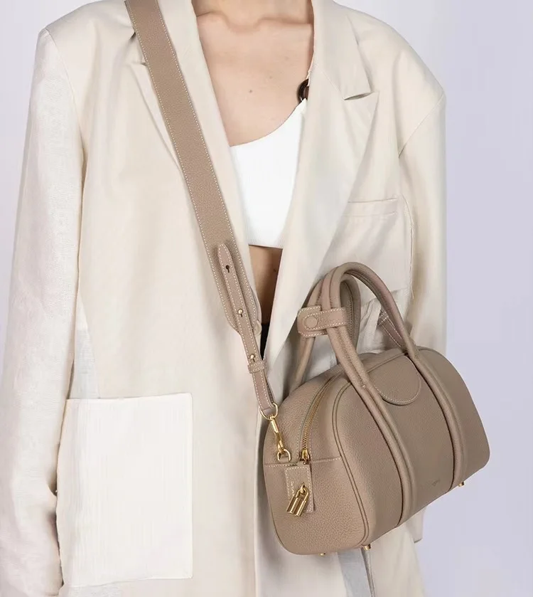 Trendy and stylish, minimalist bowling bag series, large capacity retro cowhide top layer, one shoulder portable crossbody bag