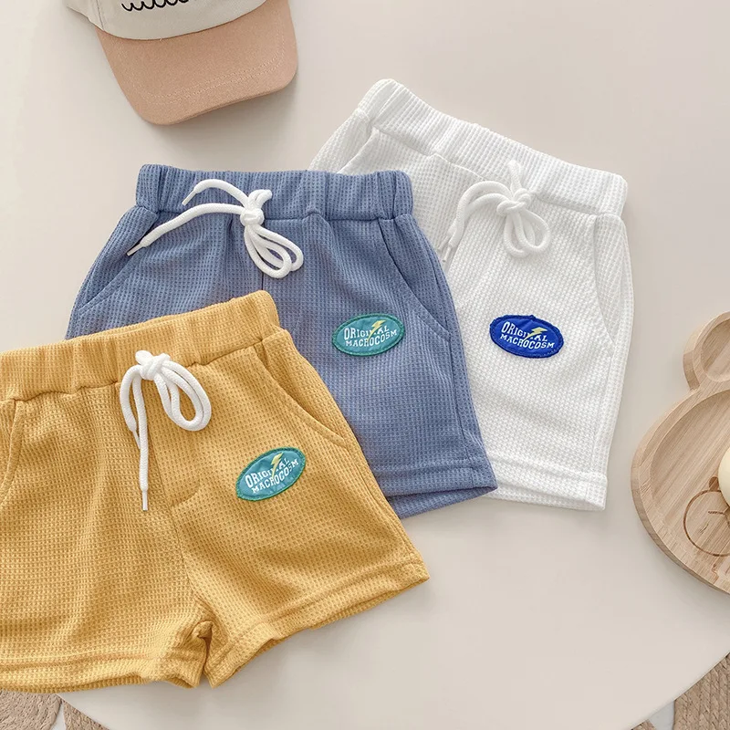 

Летние детские трикотажные шорты для мальчиков и девочек, свободные спортивные шорты с эластичным поясом, Повседневные детские шорты в Кор...