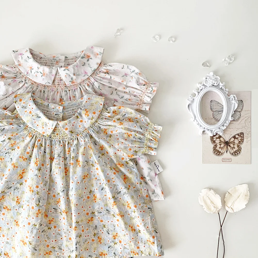 

Детская одежда, рубашка с коротким рукавом для девочек, хлопковая блузка с кукольным воротником, милая Повседневная рубашка с цветочным принтом с отворотом и пышными рукавами для принцессы