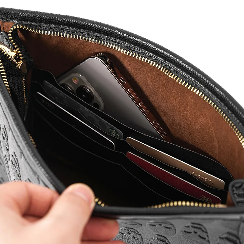 Fashion Rock Style Men's Clutch Bag Embossing Skull Leather Clutch Men Handbags Luxury Business Hand Bag Male Ipad Bag Purse
