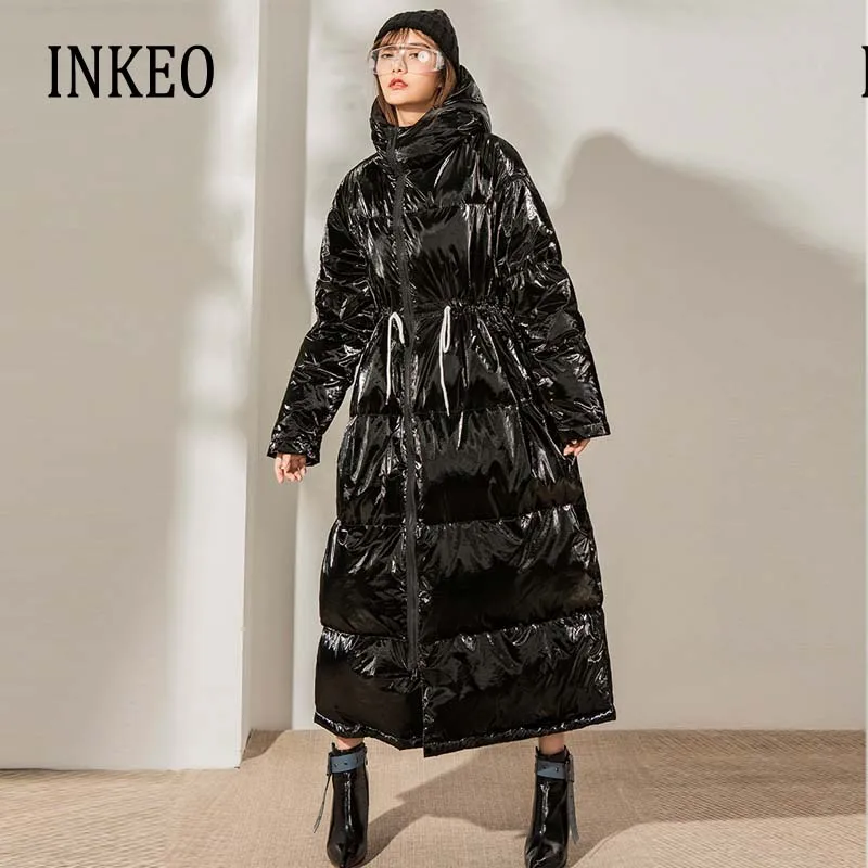 Женский длинный пуховик больших размеров