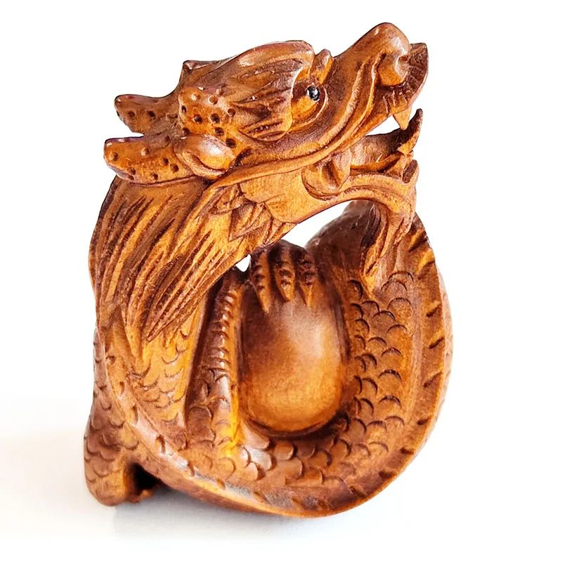 

Ручная резная статуэтка из боксавода "Дракон с жемчугом"