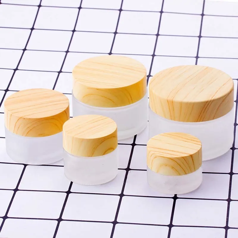 

Mini Refillable Glass Jar Cosmetics Subpackage Filling Wood Grain Cap Bottle Face Cream Lipstick Storage Container Frosting