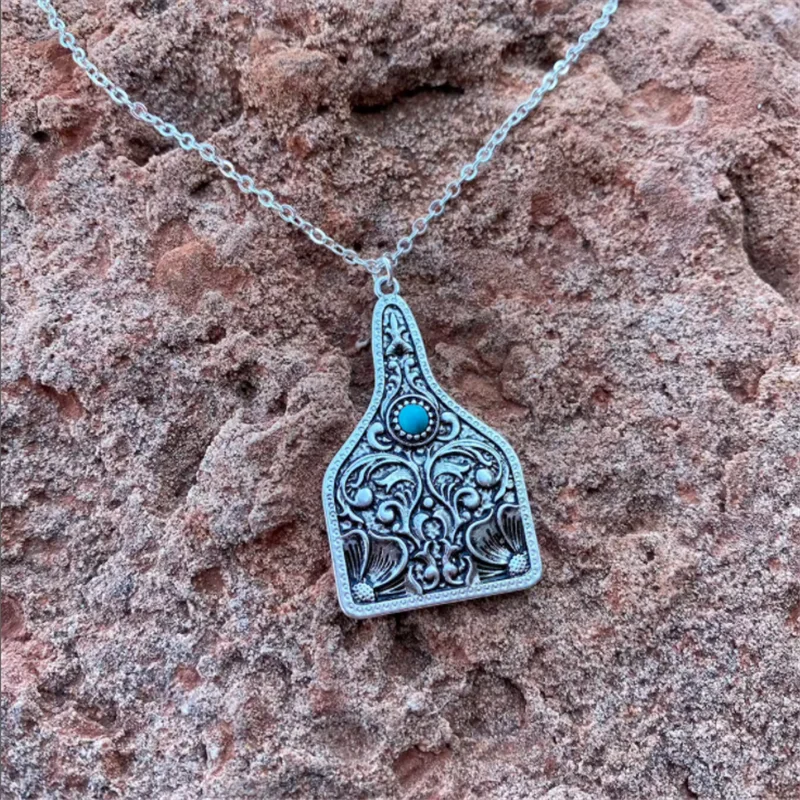 

Western Cattle Tag Casting Pendant Necklace for Women Men Medium Size Cattle Tag Necklaces with Small Turquoise Stone Boho Style