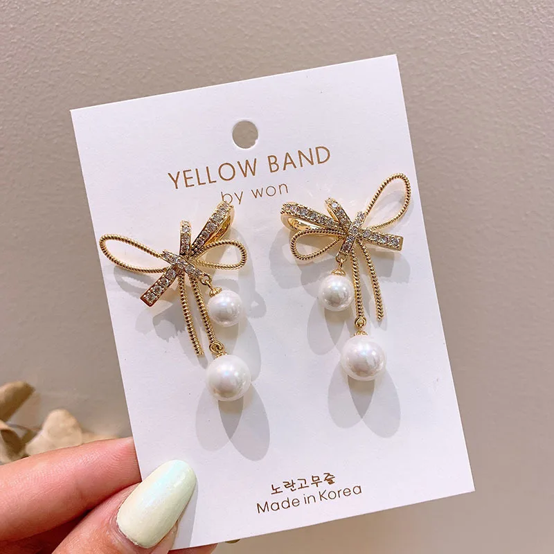 

Korean New Fashion Bowknot Pearl Drop Earrings for Women Gold Chain Long Crystal Rhinestones Stud Jewelry Wedding Party Gift