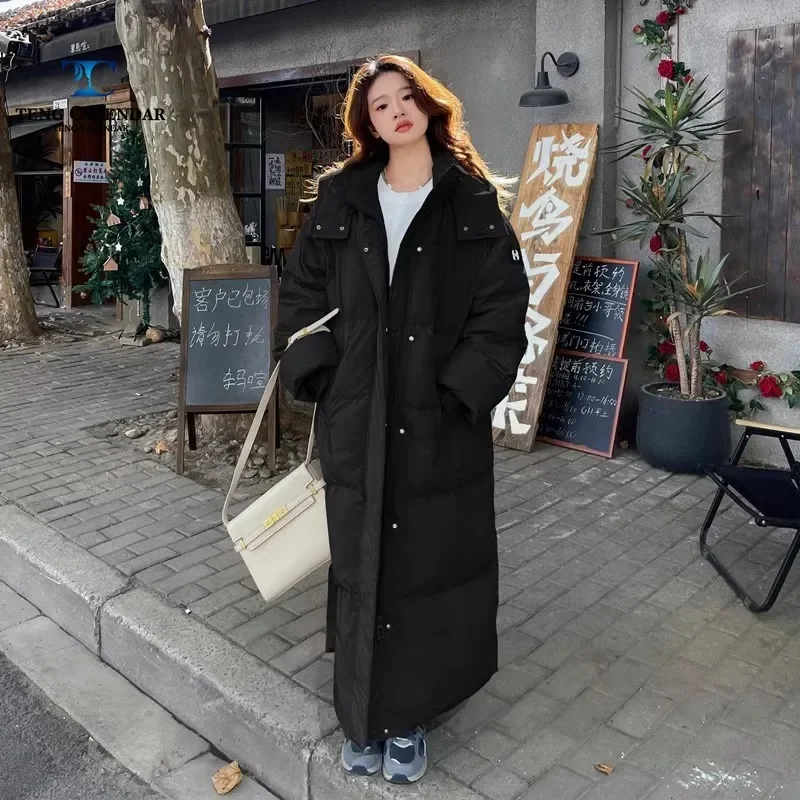 Длинная и толстая женская куртка до колена на утином пуху высококачественная