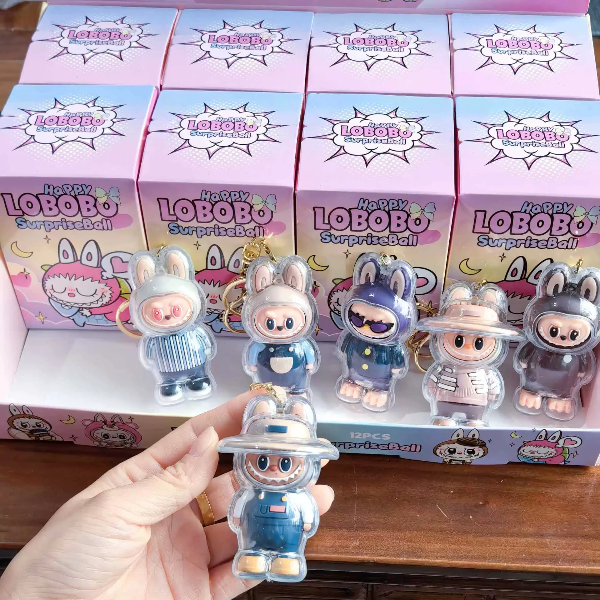 Labubu Schlüsselanhänger Слепая сумка The Monsters Vinyl Gesicht Puppe Herzbewegende Blindbox Рюкзак Anhänger Dekoration Macaron