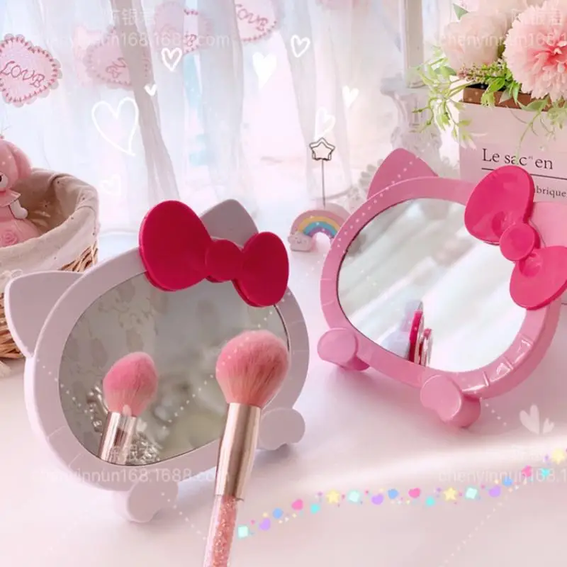 

Новинка кавайная Sanrioed Hello Kitty милая девочка мультяшное зеркало для макияжа с бантом настольное туалетное зеркало подвесное настенное зерка...