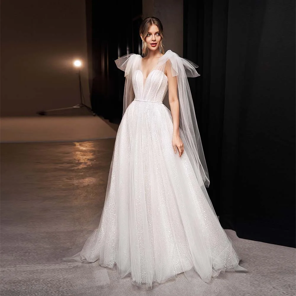 

Classic Wedding Dresses 2022 New Sweetheart Sparkle Tulle With Bow Bride Dress Lace Up Sleeveless Beading Bridal Gown For Women