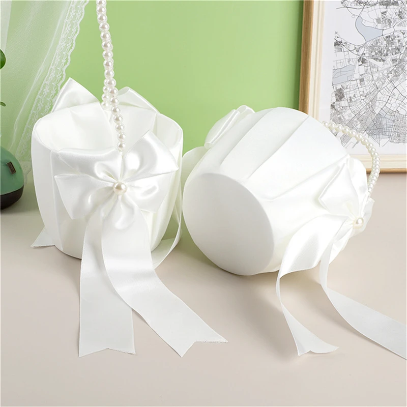 

Wedding flower basket, white fairy pearl flower basket with pearl handle, suitable for flower children.