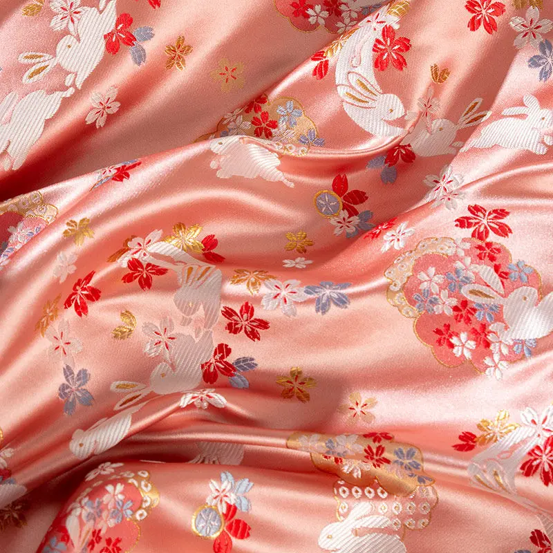 Фото Nishijin жаккардовая ткань 150 см с золотым кроликом, японская блузка Cheongsam, тибетский монгольский халат, чайный коврик, материал №1