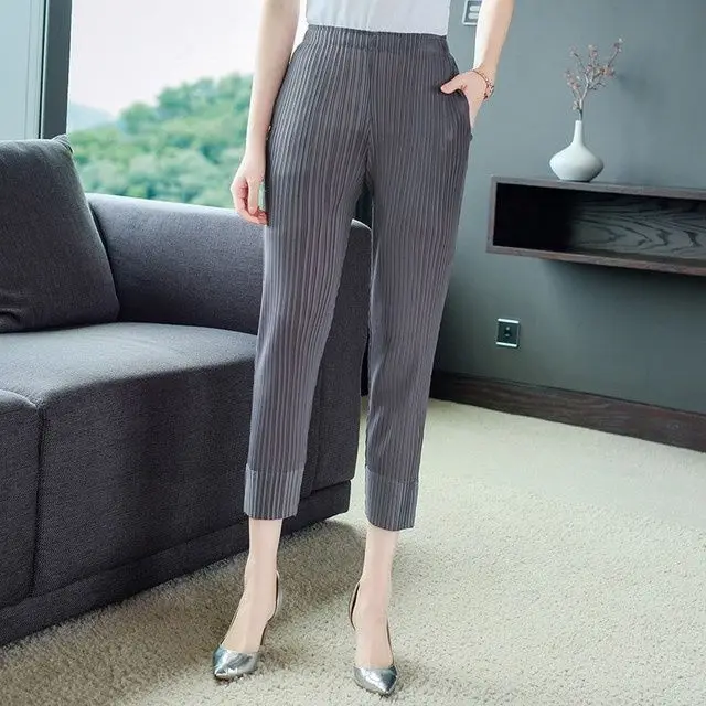 

Women's Carrot Pants Miyake Pleated Loose Pocket Elastic High Waist Harem Trousers Korean Style Female Summer Casual Bloomers