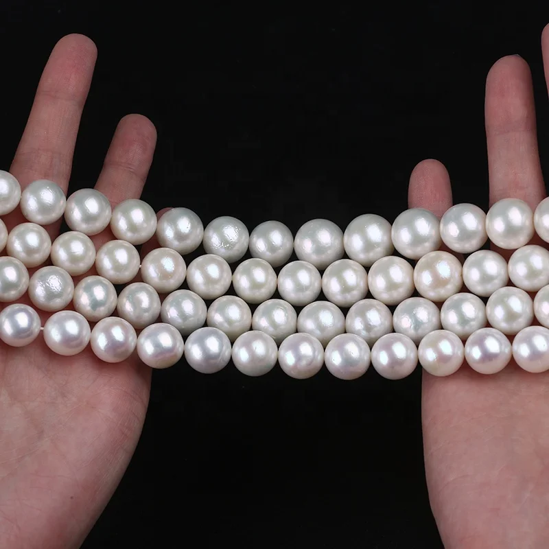 

Wholesale 11-15mm AAAA grade cultured freshwater pearl strand natural edison round loose pearls string for jewelry making