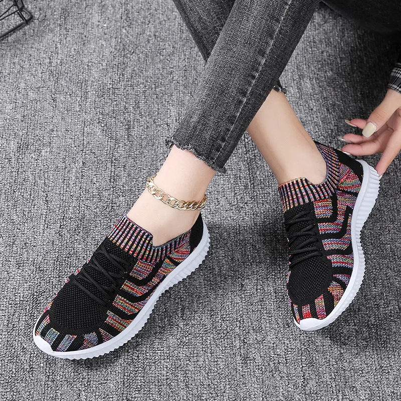 

New Sports Flying Knitted Socks Shoes Elastic Cloth Large Size Women Shoes Europe and America Breathable Casual Women Mesh Shoes