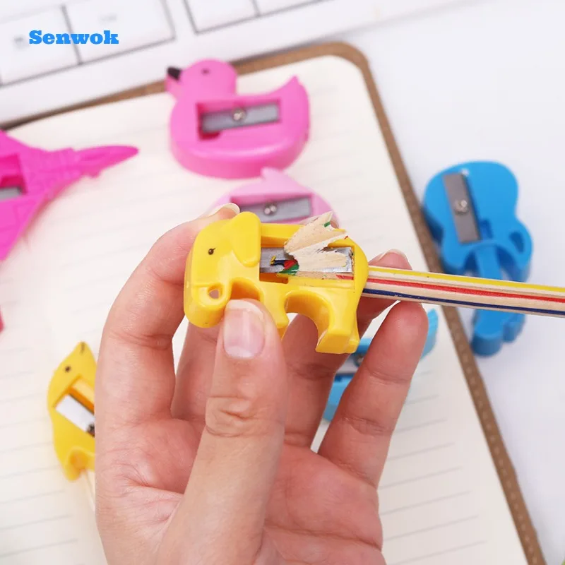 

1PCS Random Cartoon shape pencil sharpener Elementary school students learn stationery prizes learning stationery