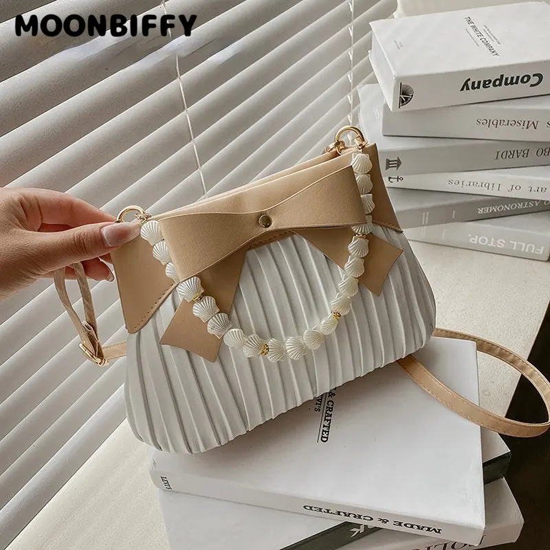 

Women Bag 2023 Summer New Korean Version Fashion Retro Bow Pleated Shell Women One-shoulder Hand-held Messenger Bag
