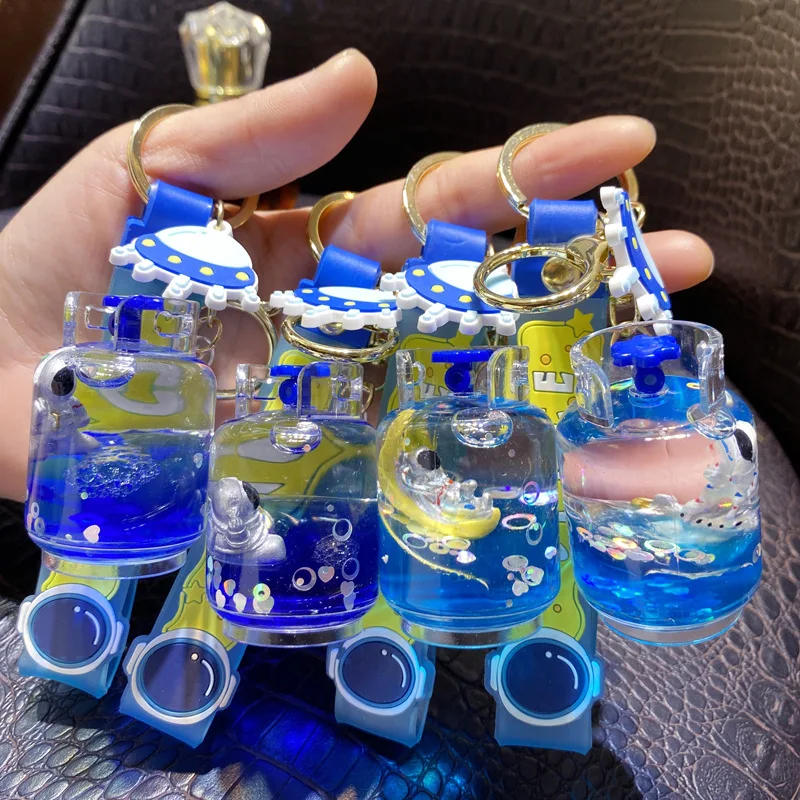 

Творческий брелок с жидкостью и зыбучим песком, астронавт, мультяшный милый акриловый в космос с жидкостью, Летающий аксессуар для автомоби...