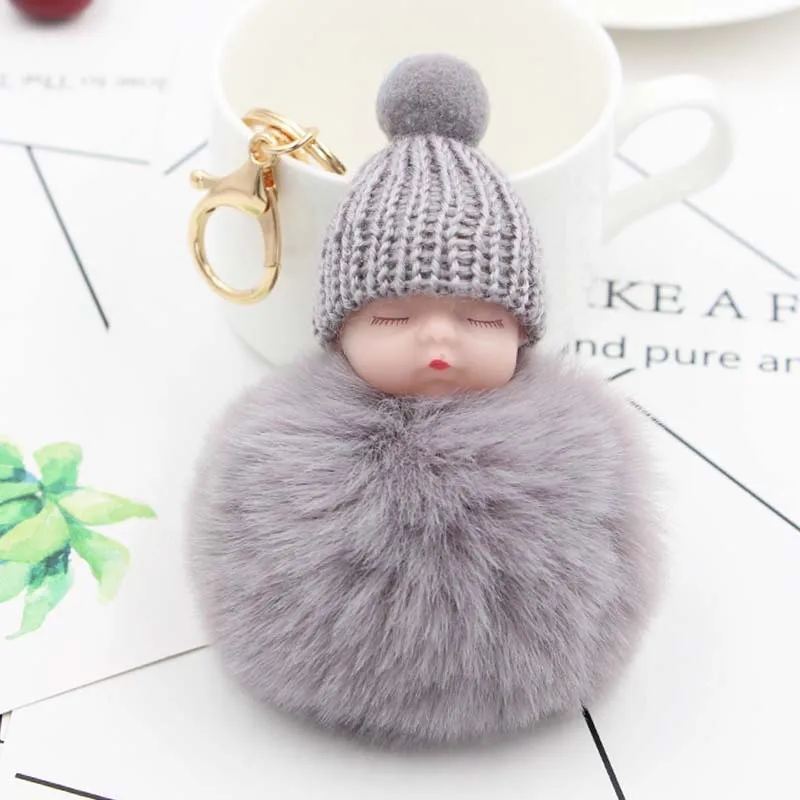 

Baby Doll Toy DropshipCute Sleeping Baby Doll Key Chains for Women Bag Toy Key Ring Fluffy Pom Pom Faux Fur Plush Keychains