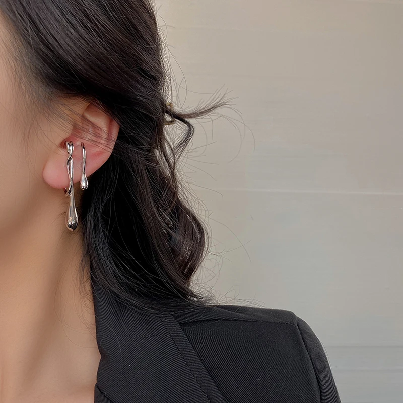 Европейские и американские модные крупные асимметричные серьги простые