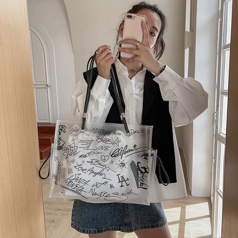 

Large-capacity Graffiti Pvc Transparent Bag Female 2022 Summer New Child Mother Bag Korean Version Fashion Handbag